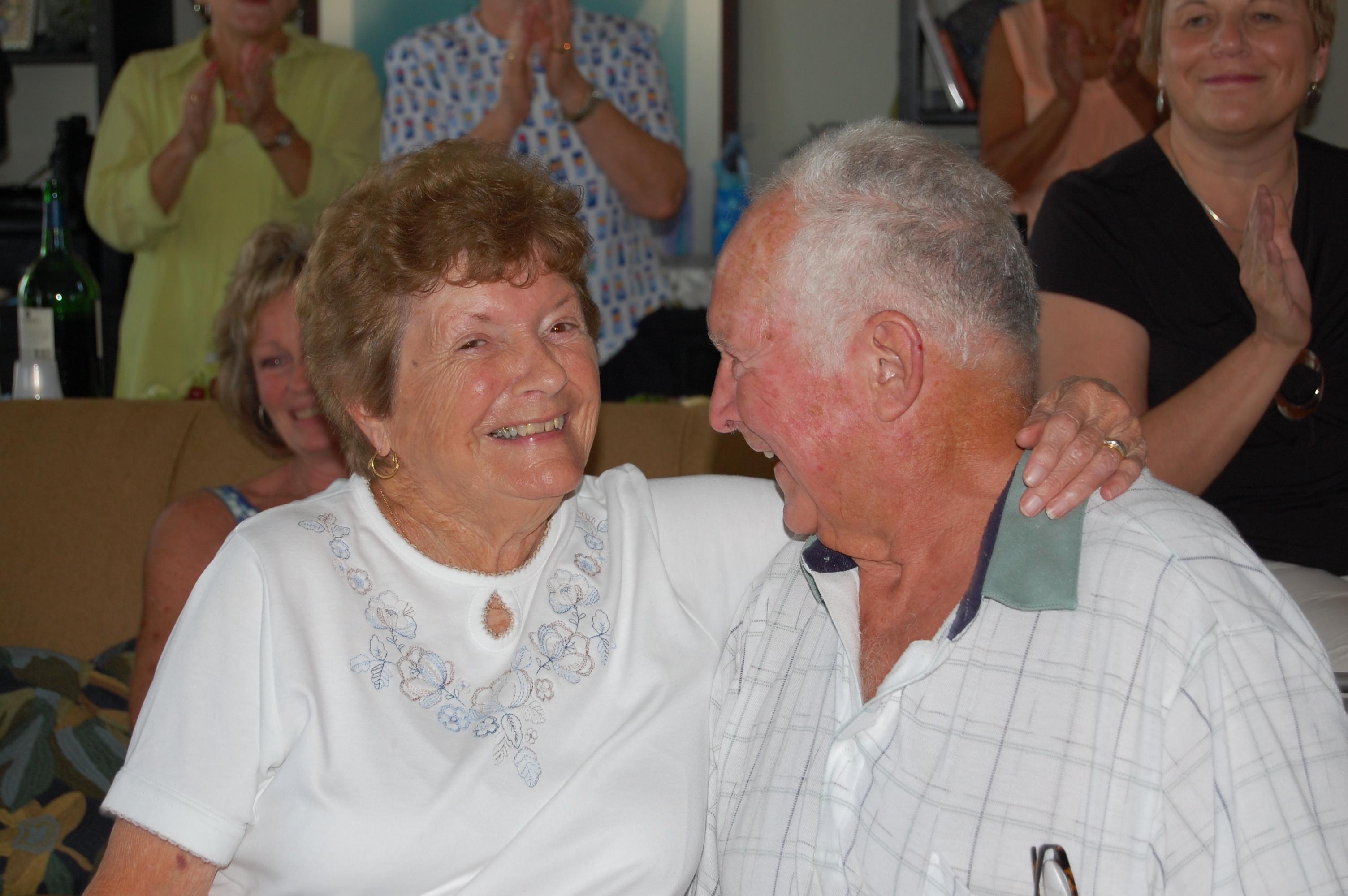 A man and woman laughing