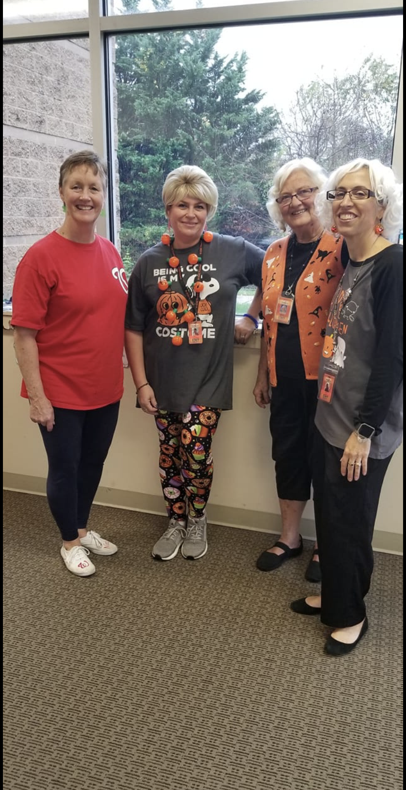A group of women posing for a photo