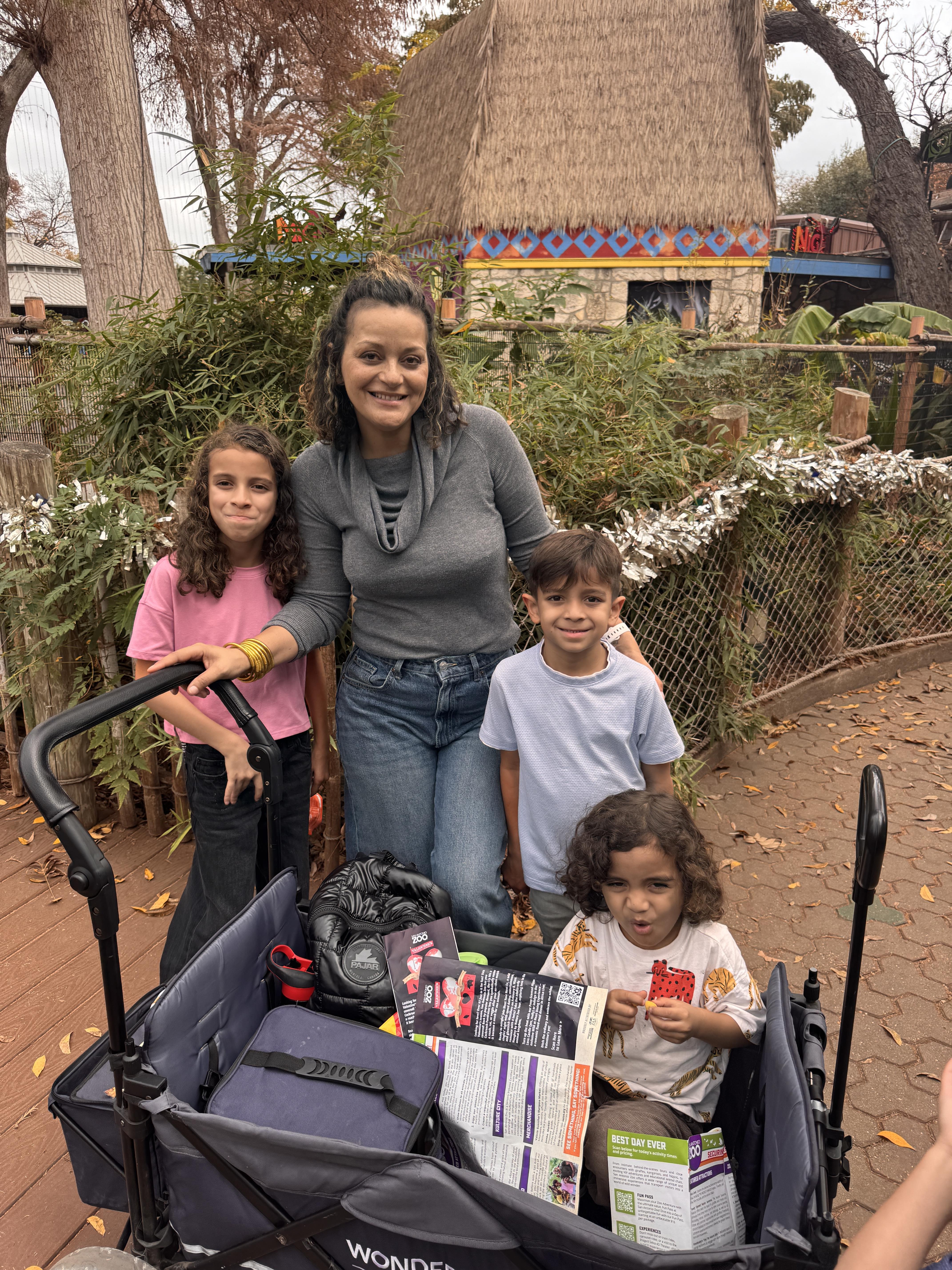 A woman and children posing for a picture