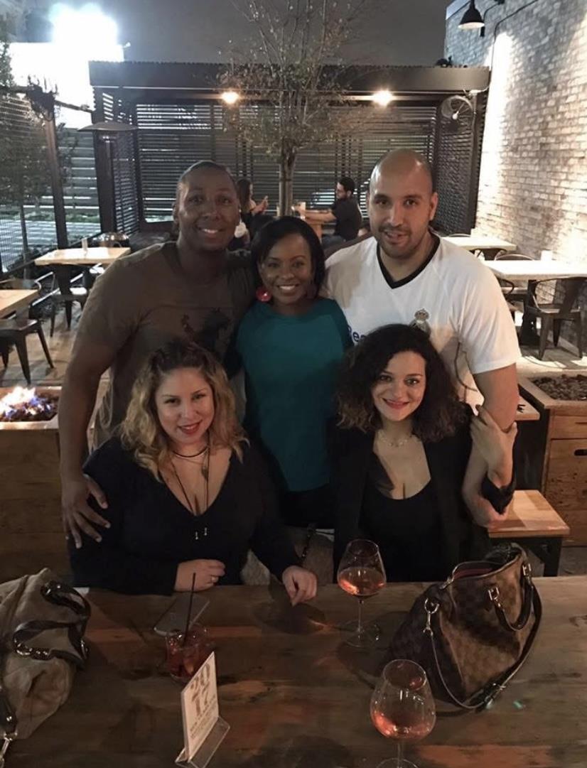 A group of people posing for a photo