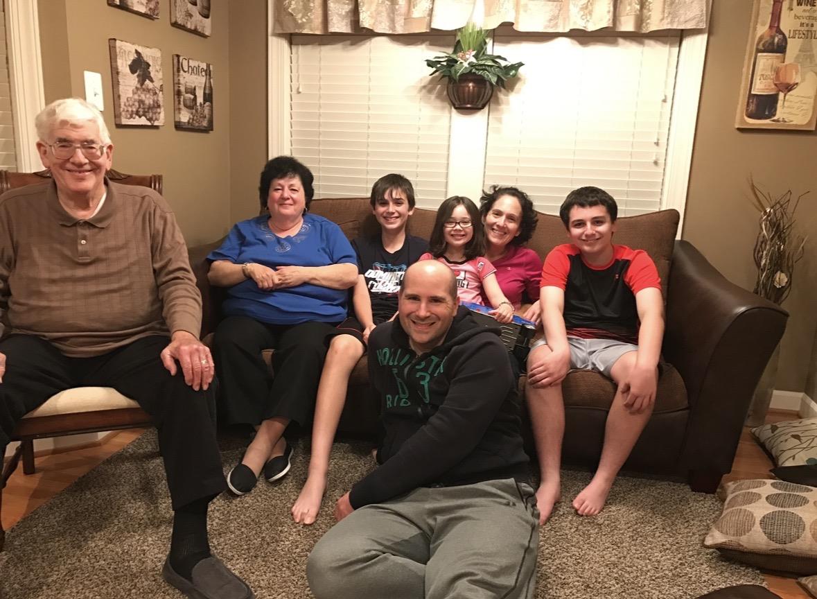 A group of people sitting on a couch