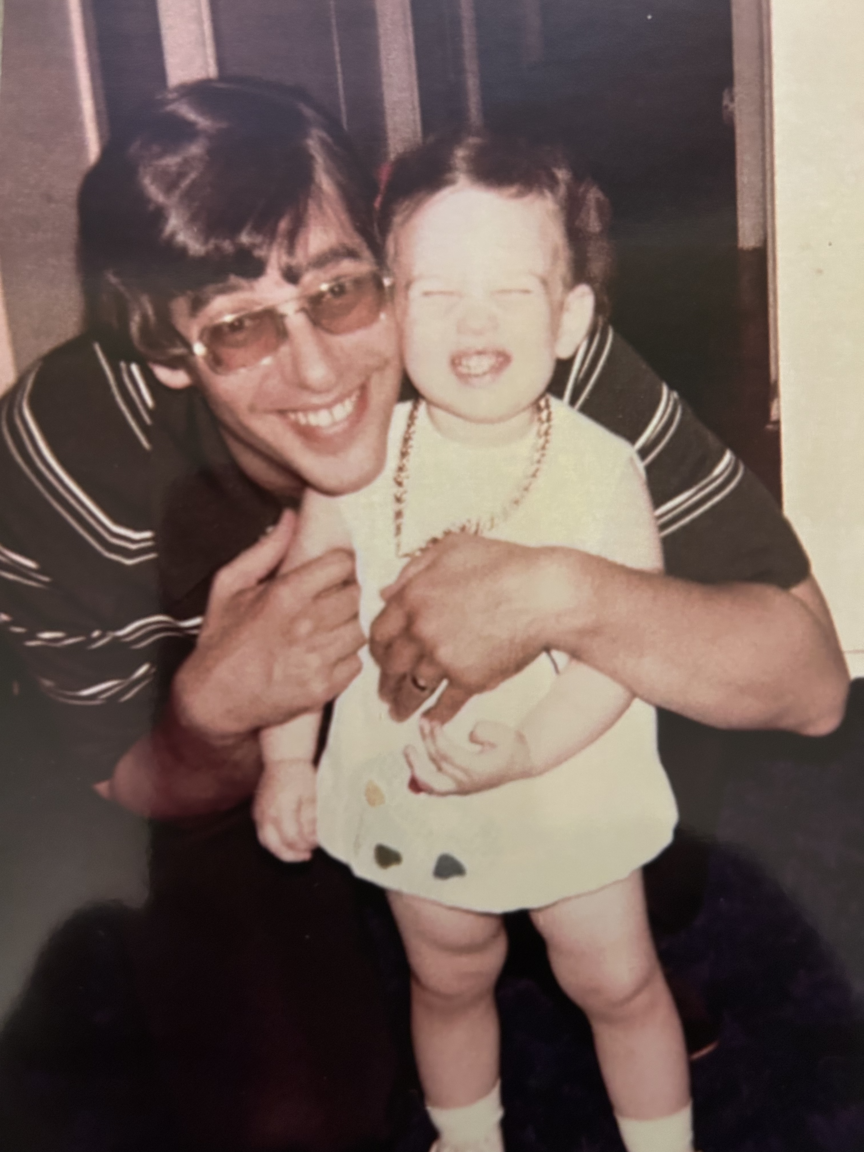 A man holding a baby