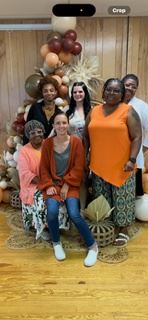 A group of people posing for a photo