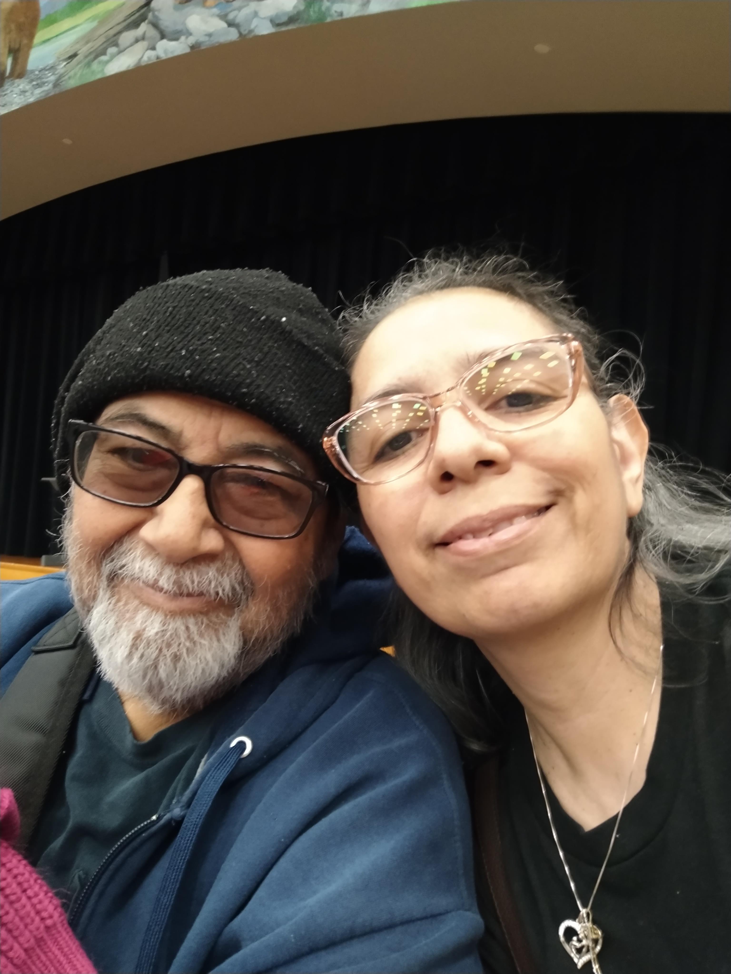 A man and woman taking a selfie