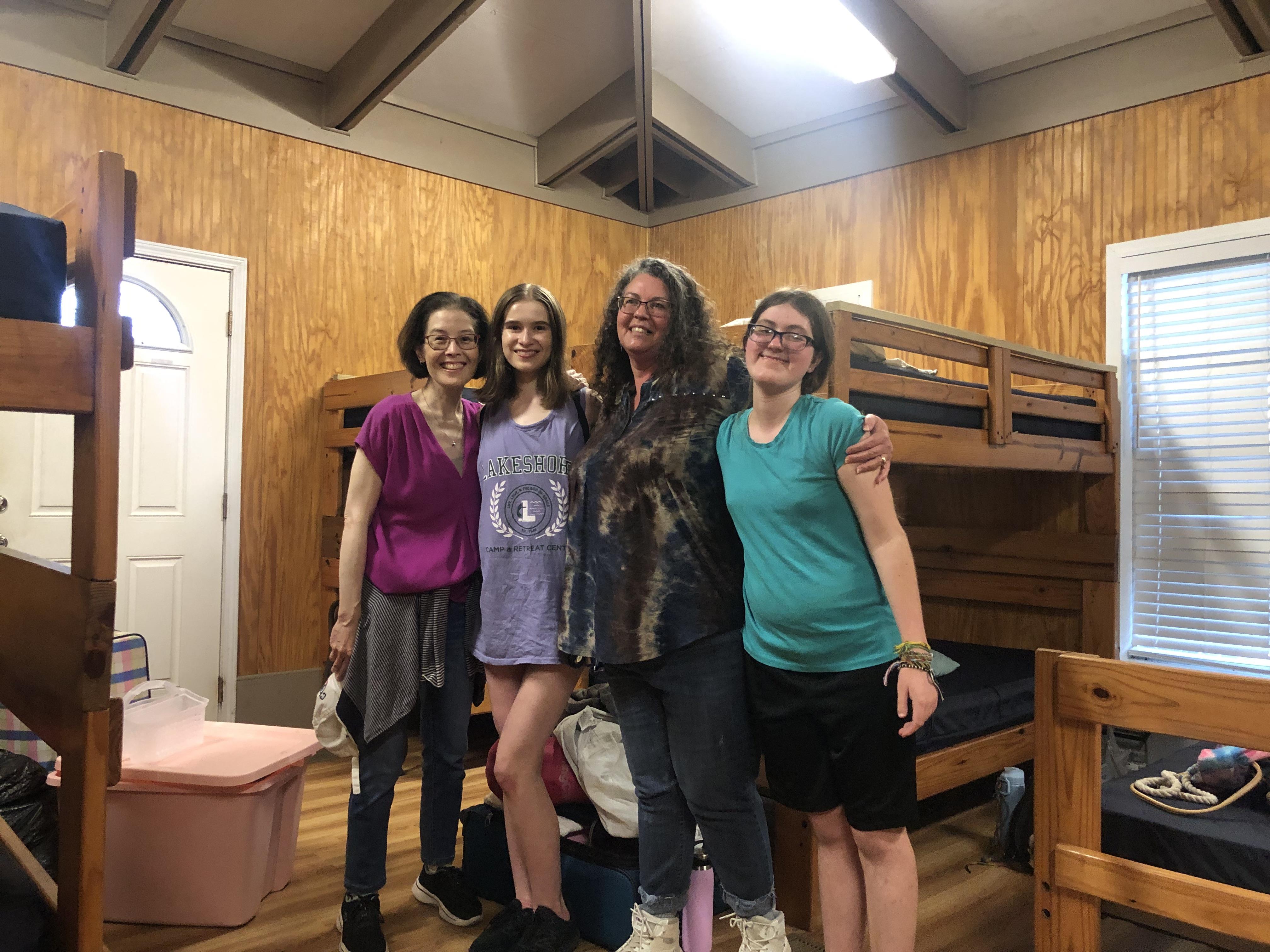 A group of women standing in a room