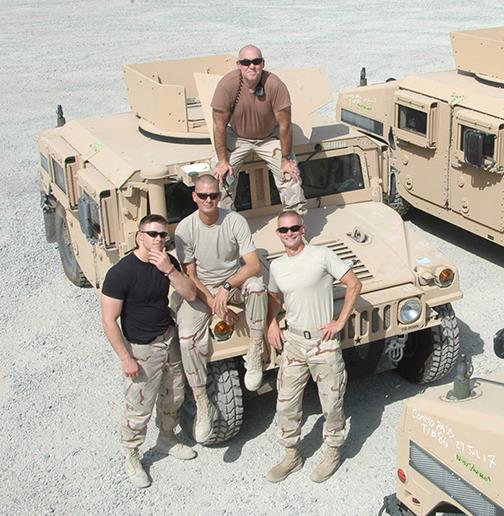 A group of men posing for a picture
