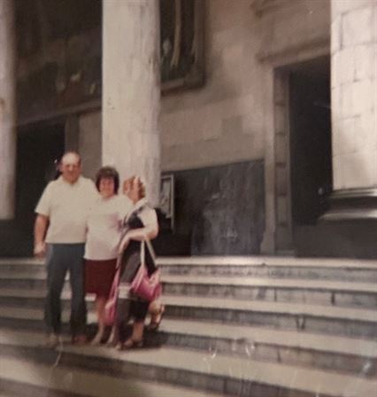A group of people standing on steps