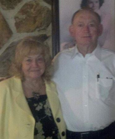 A man and woman standing next to each other