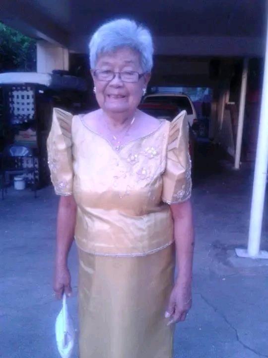 A woman in a gold dress