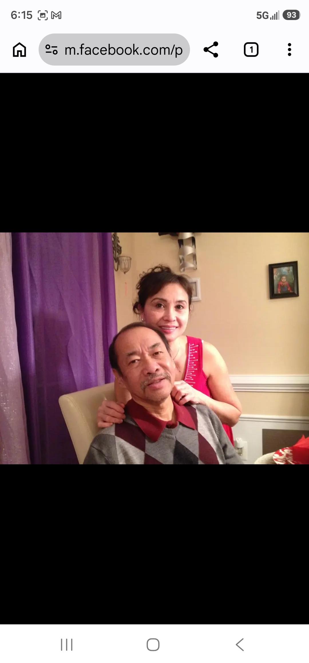 A woman standing next to a man