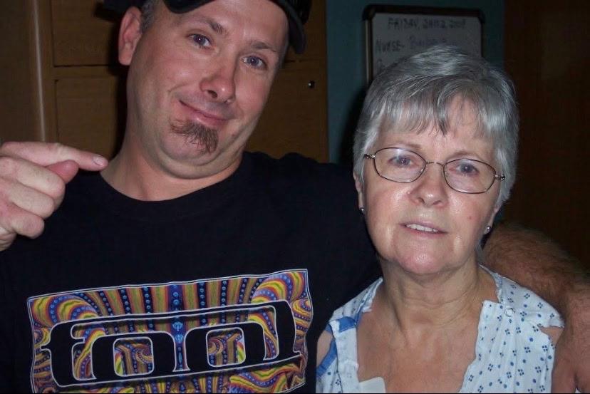 A man and woman posing for a picture