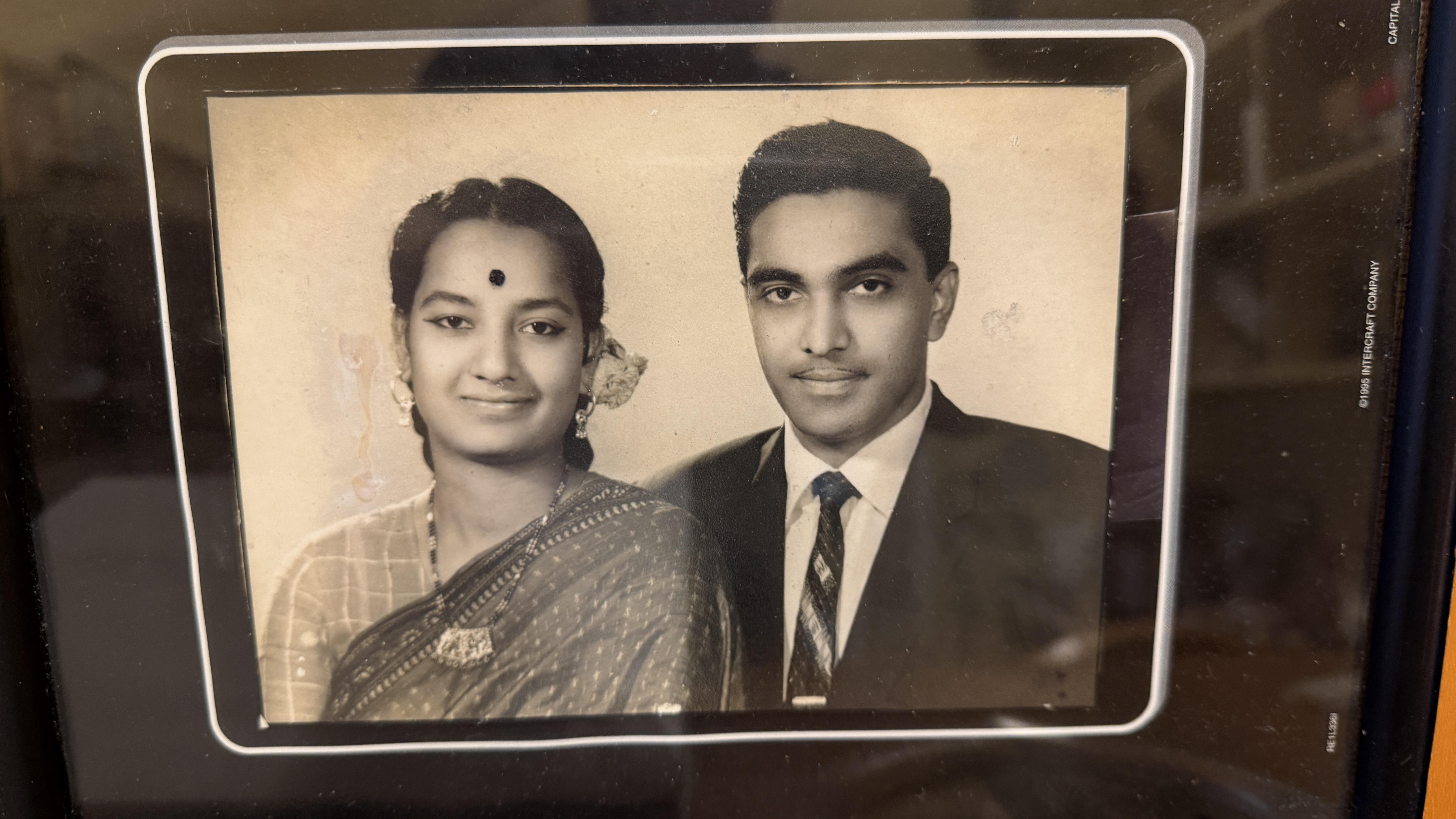 A man and woman in a frame