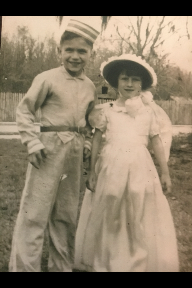 A boy and girl standing together