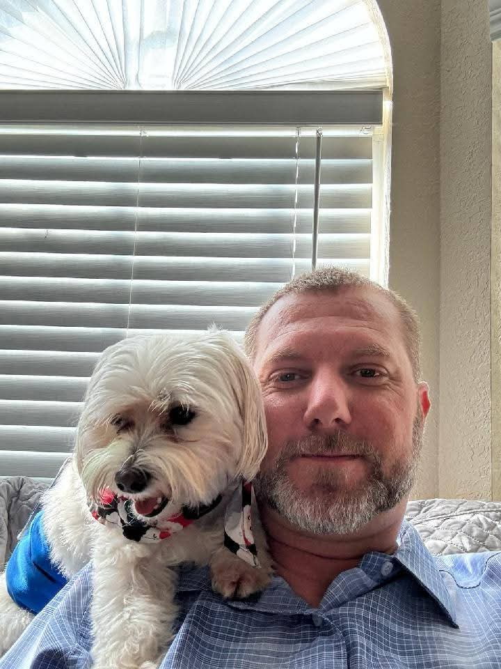 A man with a dog