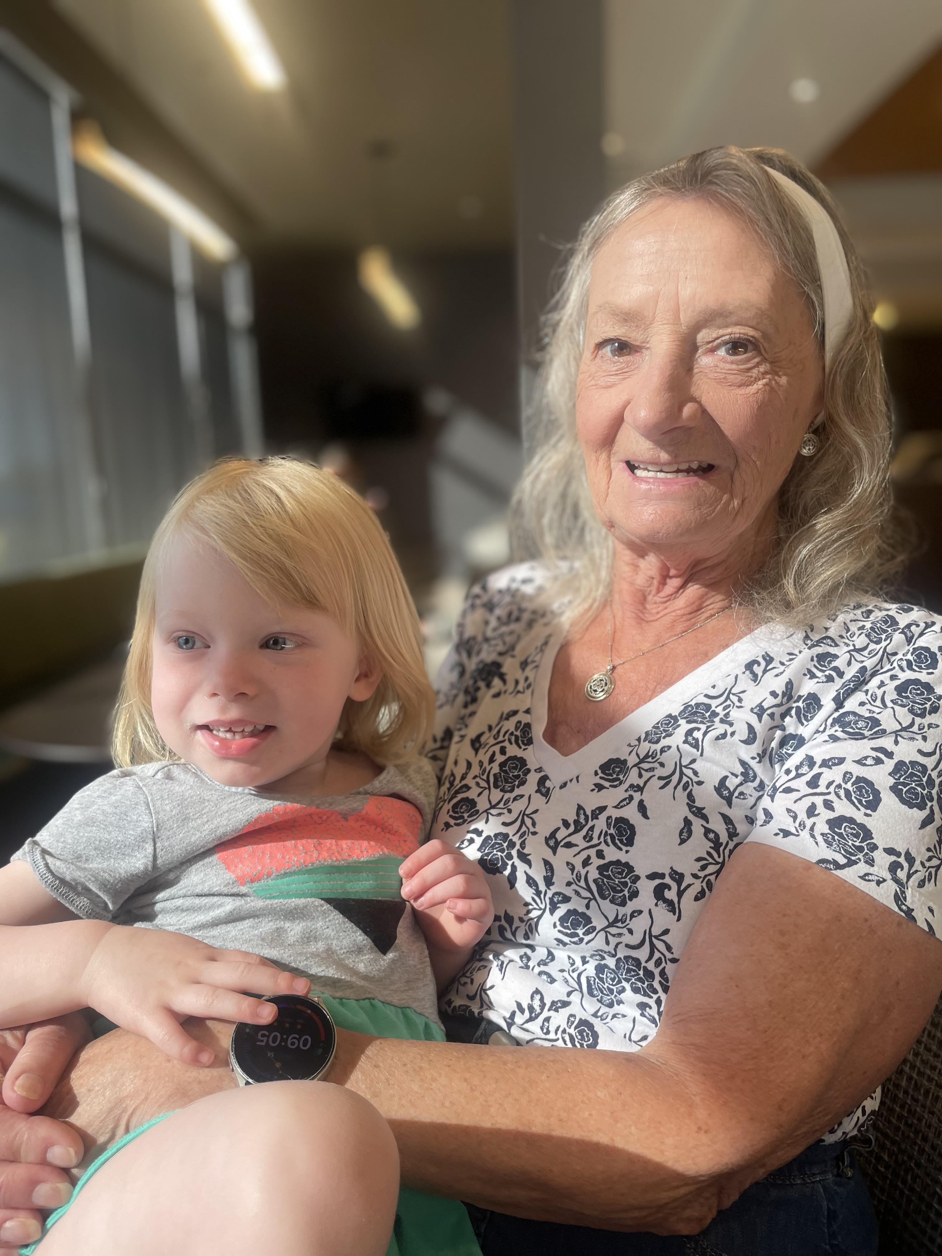A woman holding a baby