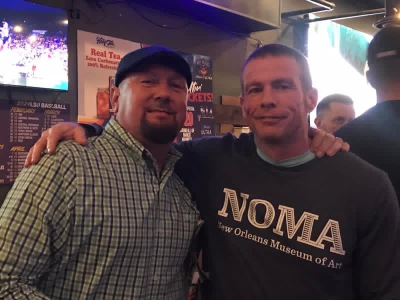 Two men posing for a picture