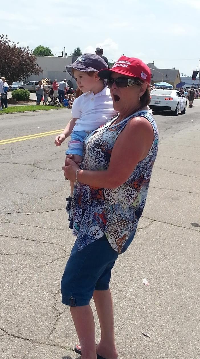 A woman holding a baby