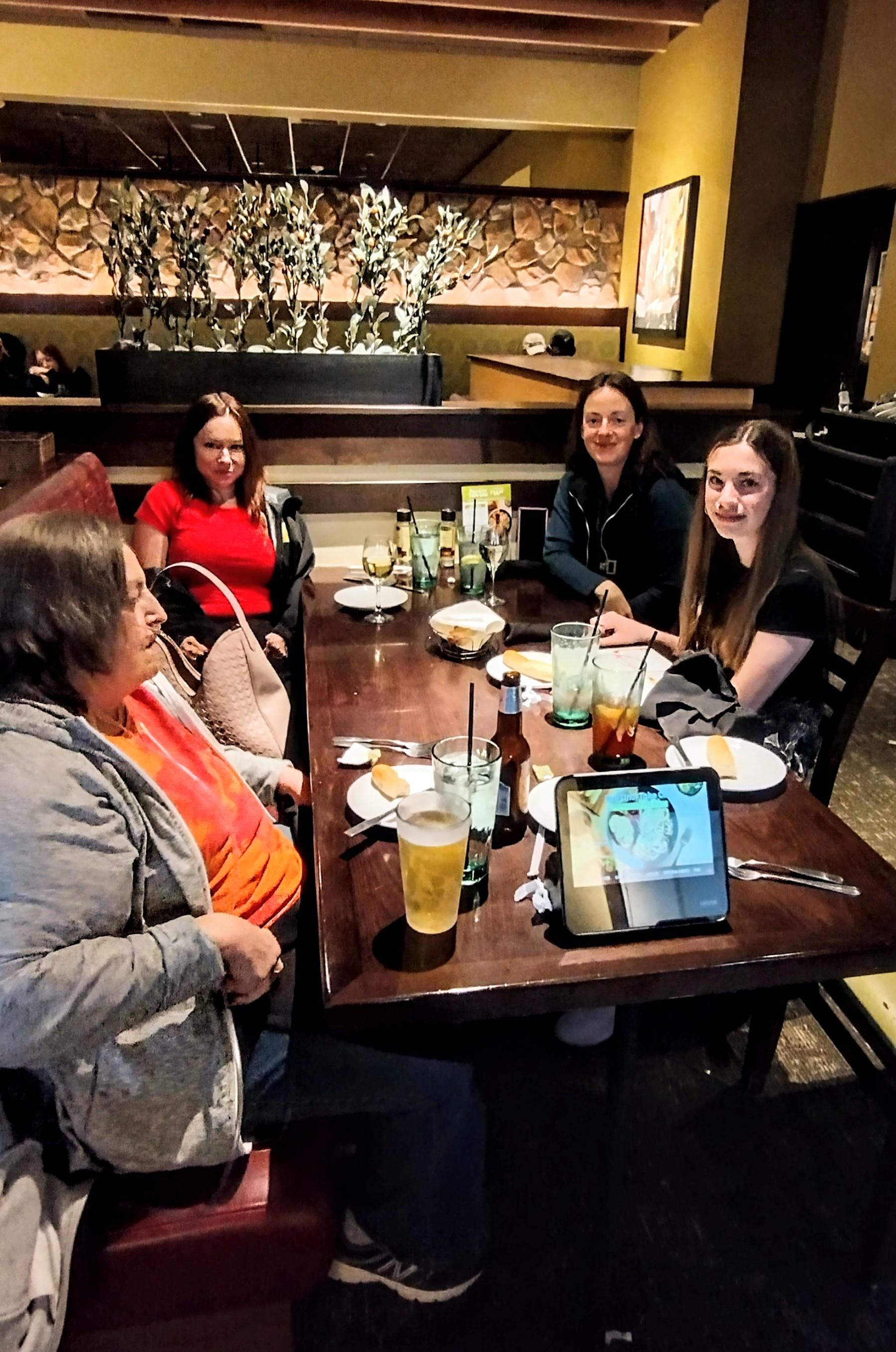 A group of women sitting at a table