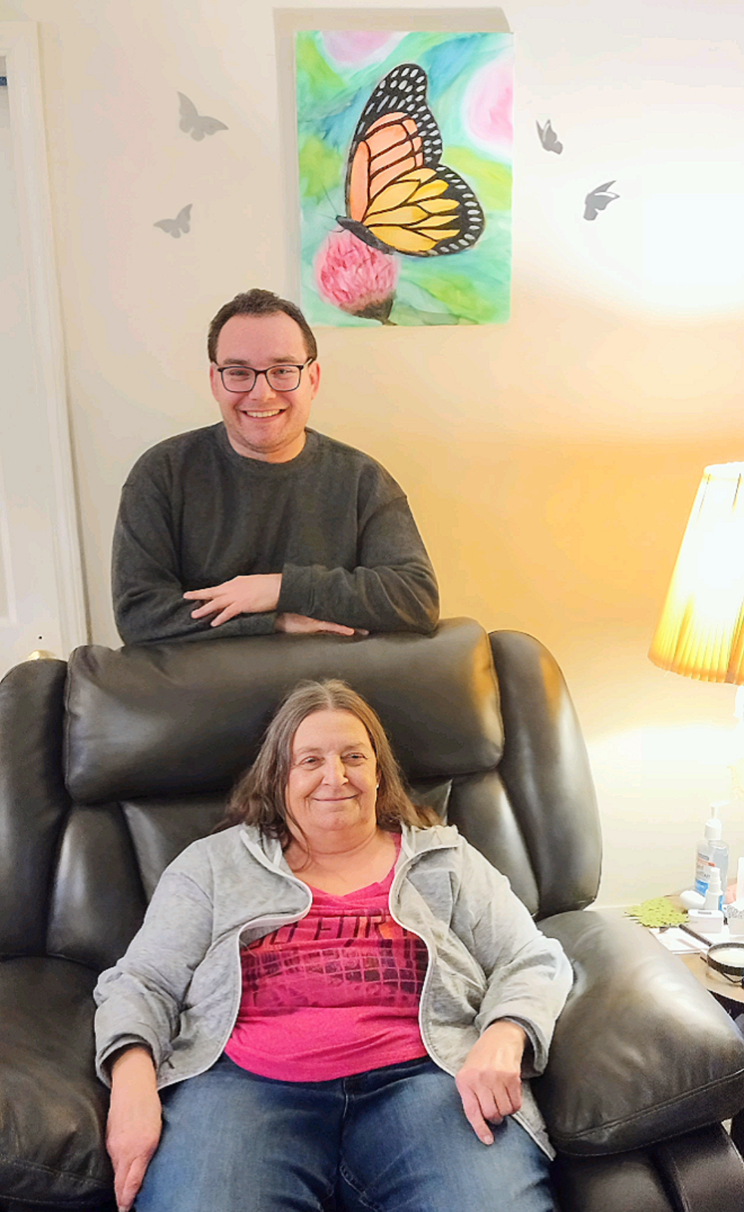 A man and woman sitting on a couch