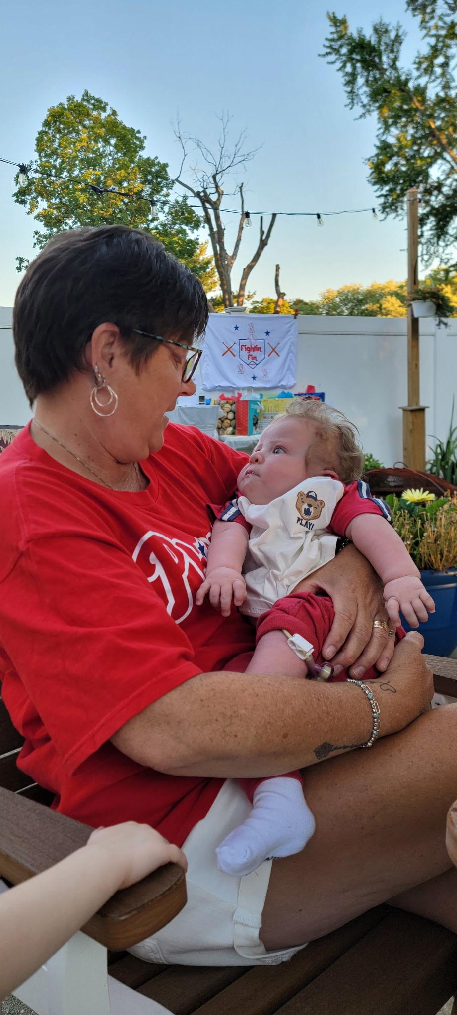 A woman holding a baby