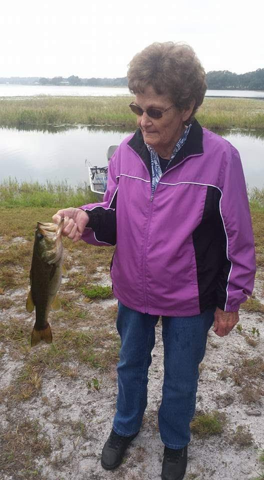 A woman holding a fish