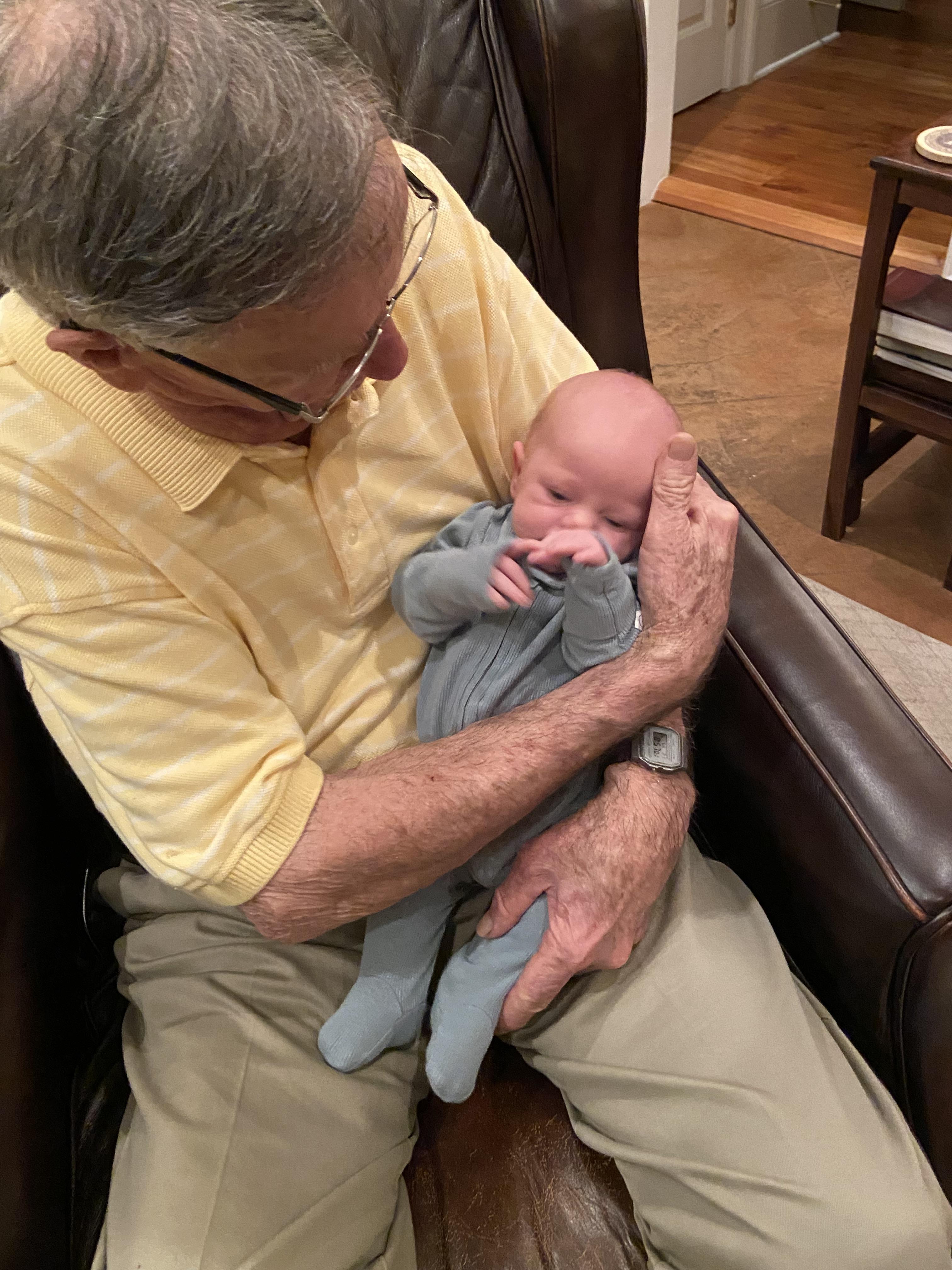 A man holding a baby