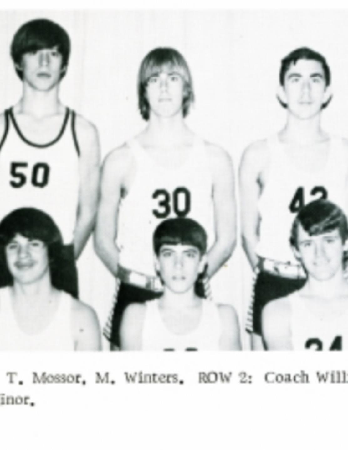 A group of young men in basketball uniforms