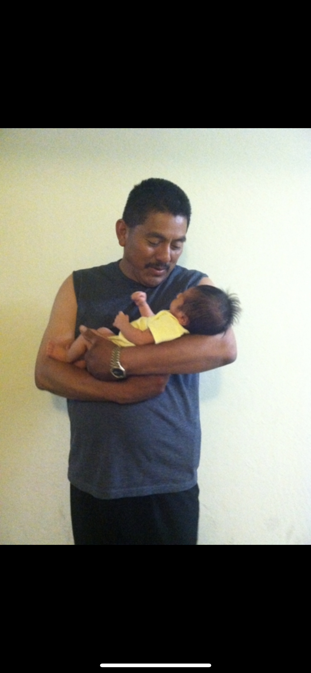 A man holding a baby