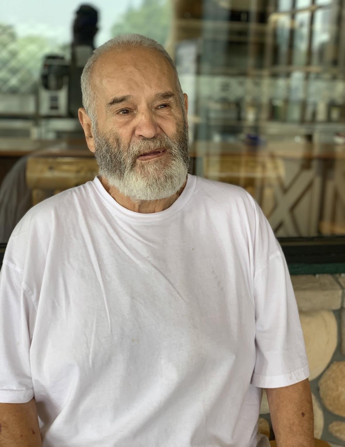 A man in a white shirt