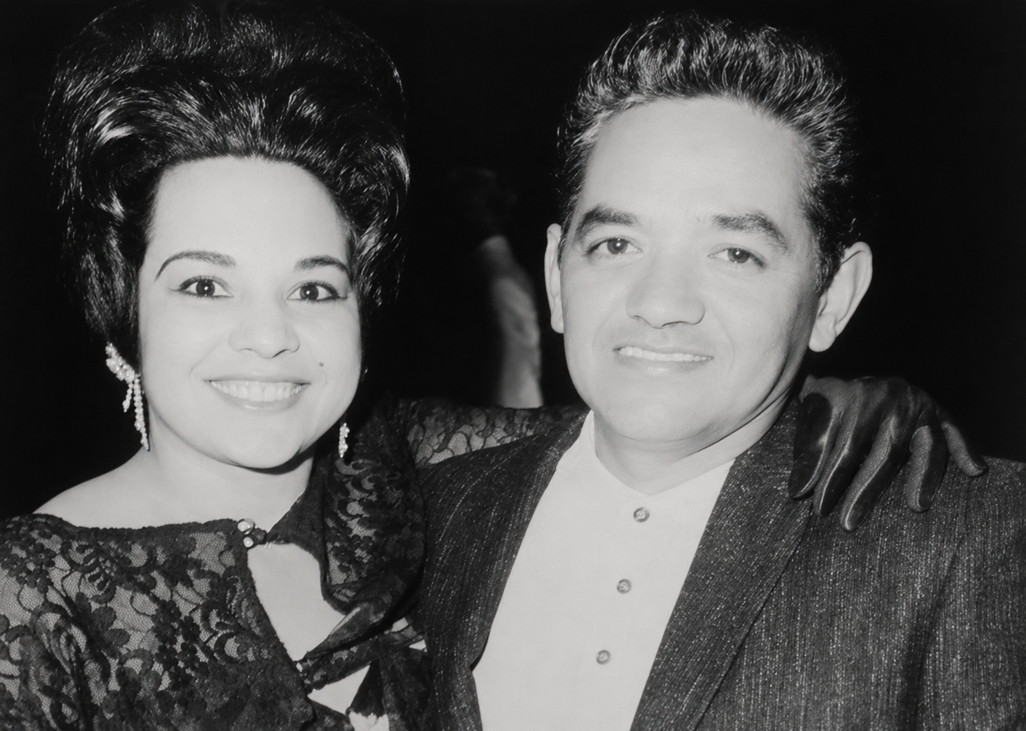 A man and woman smiling for a picture