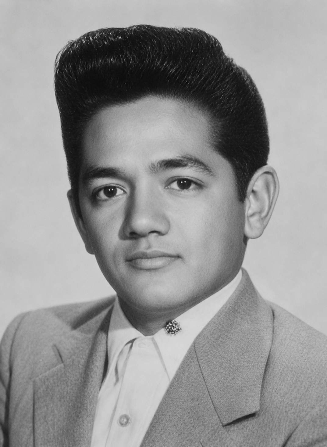 A man with pompadour hair