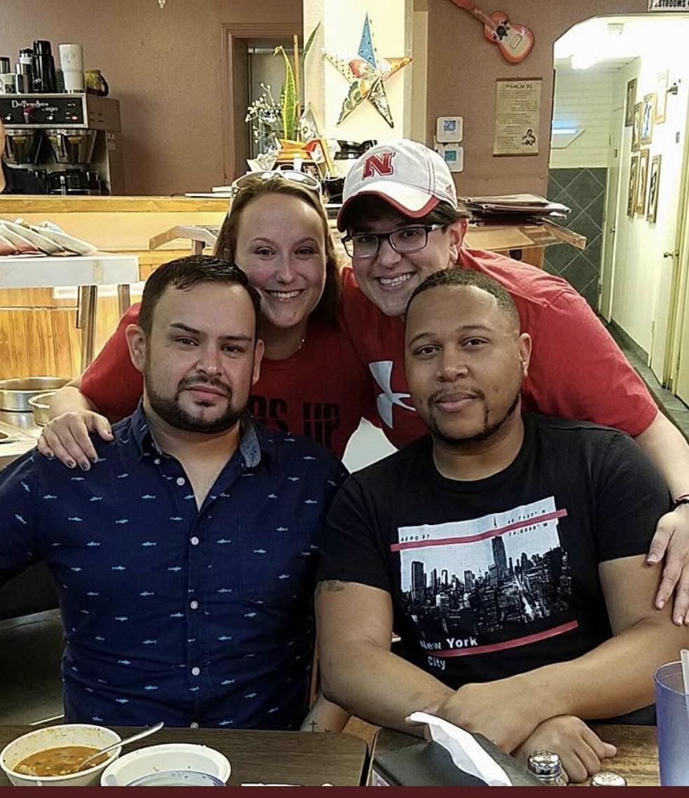 A group of people sitting at a table