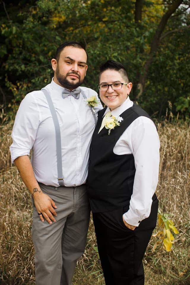 Two people posing for the camera