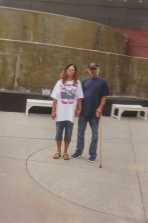 A man and woman standing next to each other