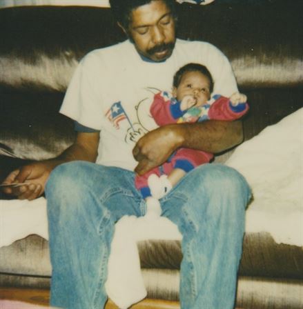 A man holding a baby