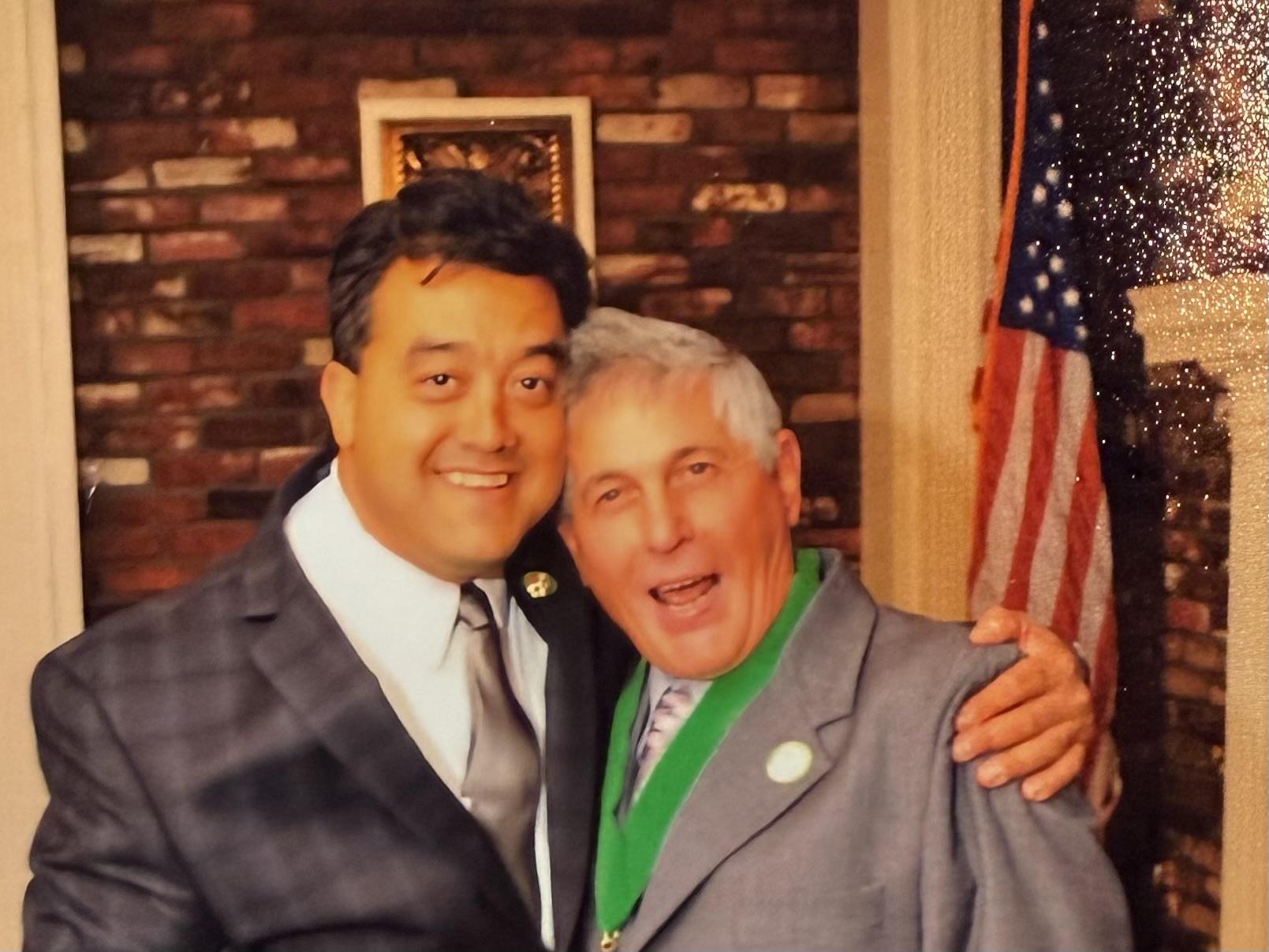 Two men posing for a picture