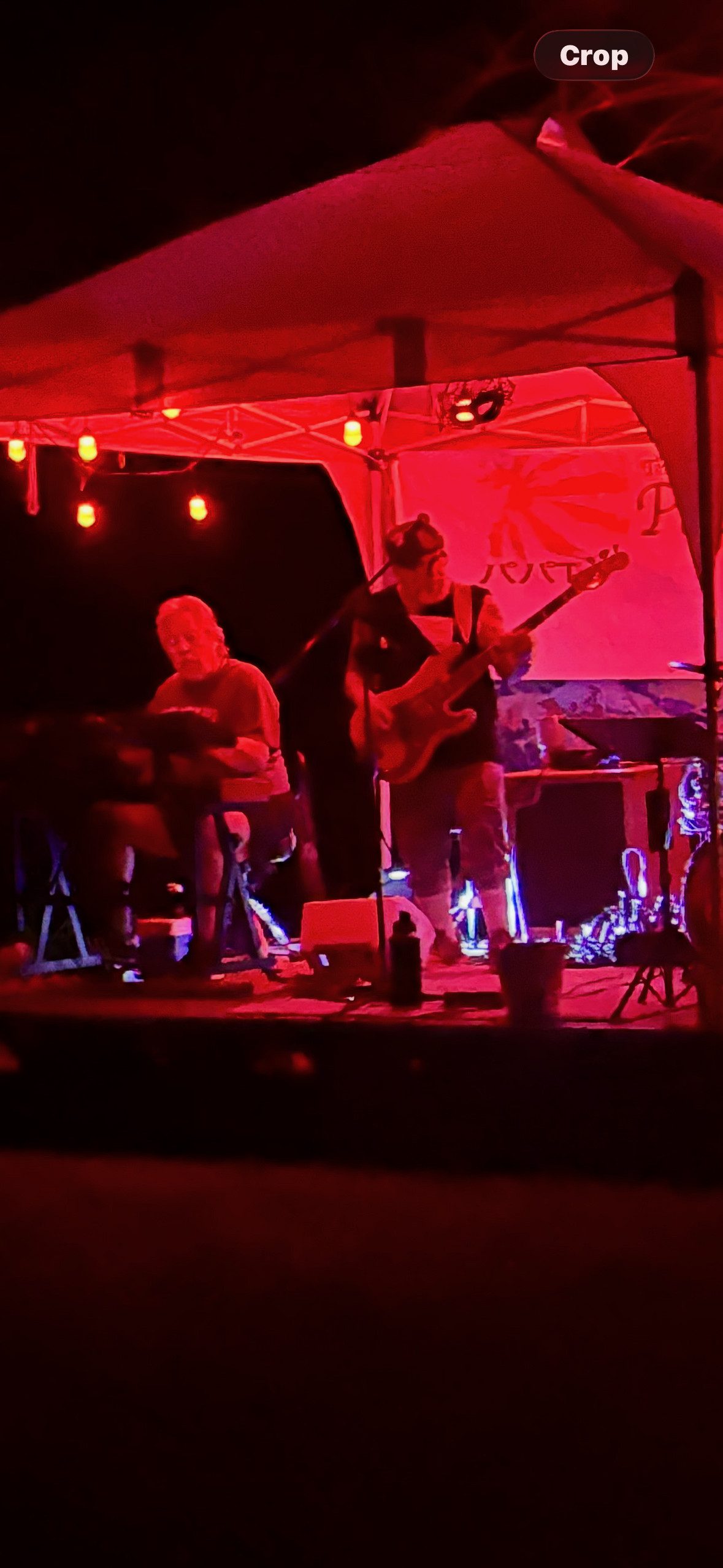 A group of people playing instruments on a stage