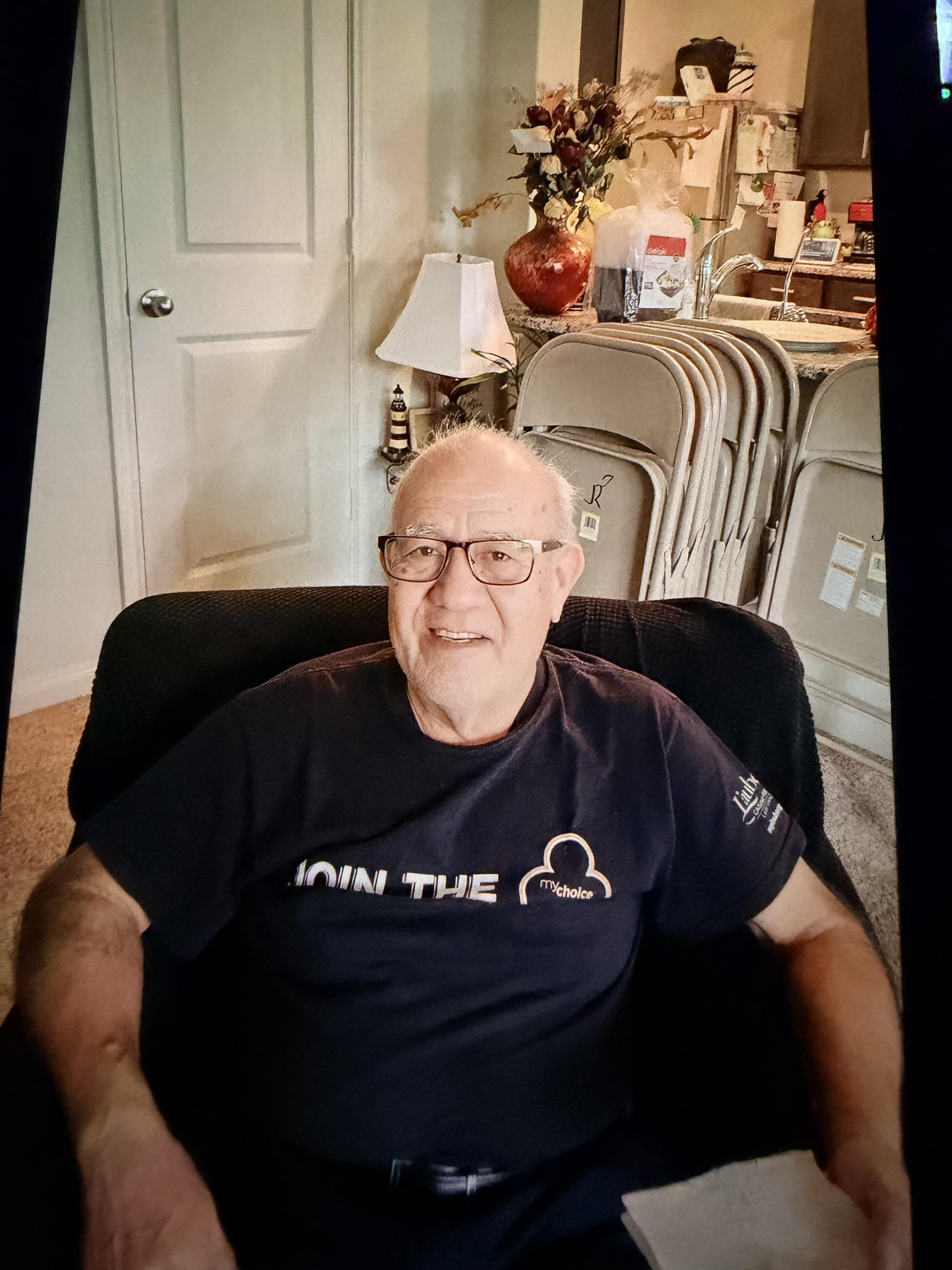 A man sitting in a chair