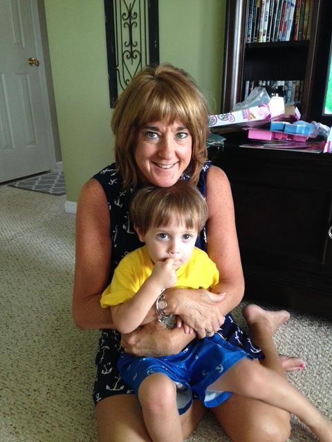 A woman holding a child