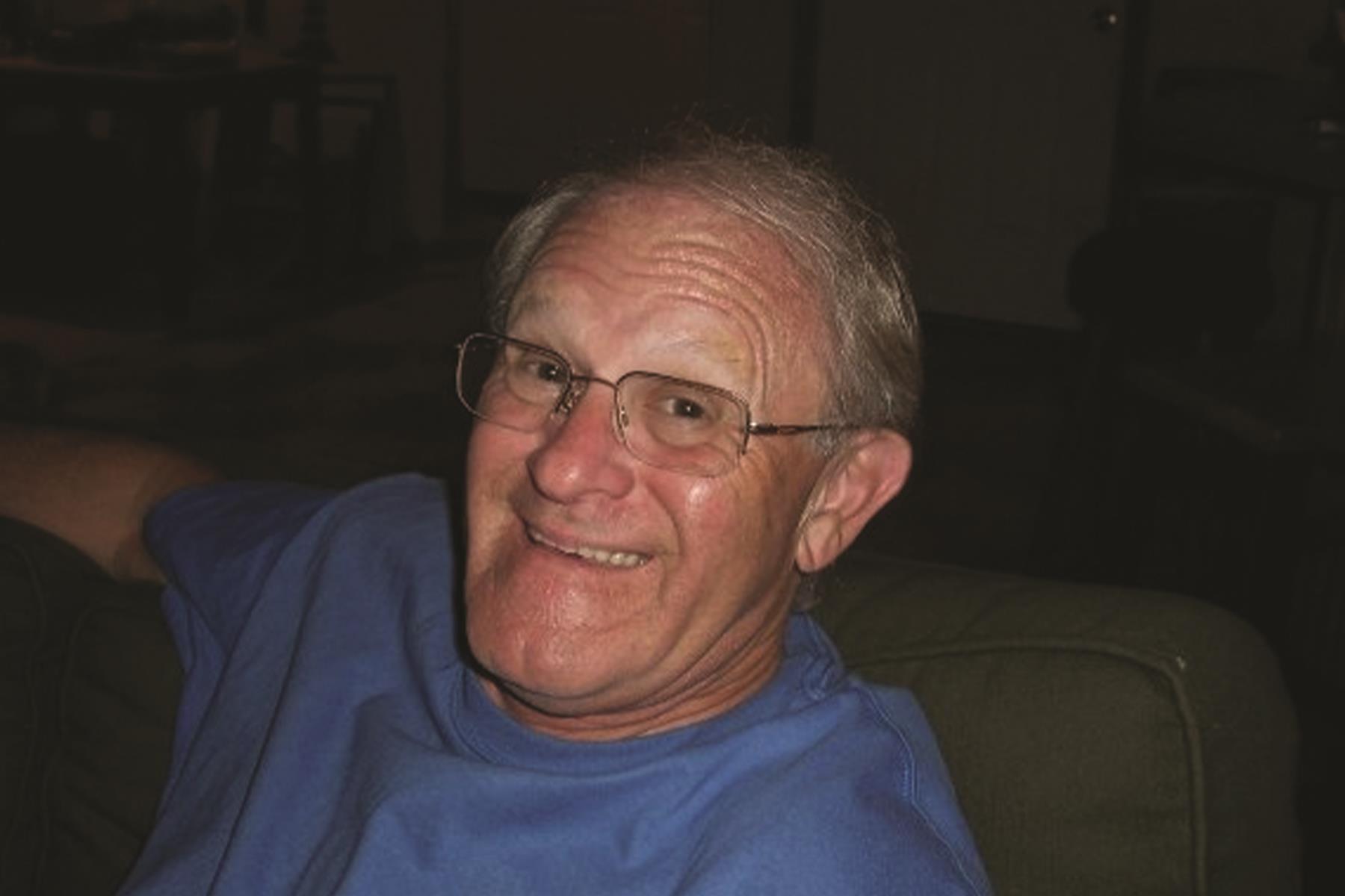 A close-up of a man smiling