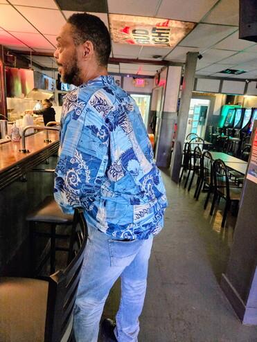 A man standing in a restaurant