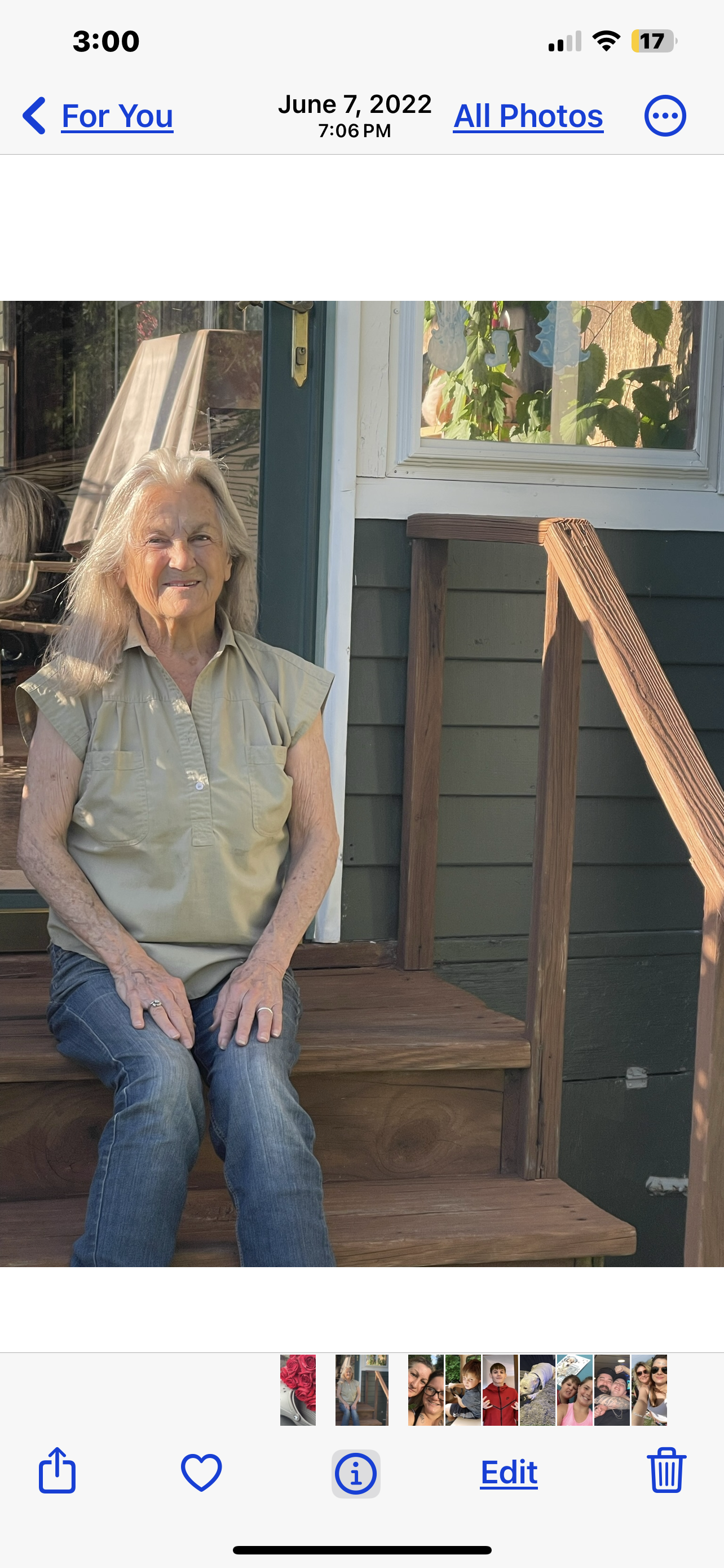 A woman sitting on a porch