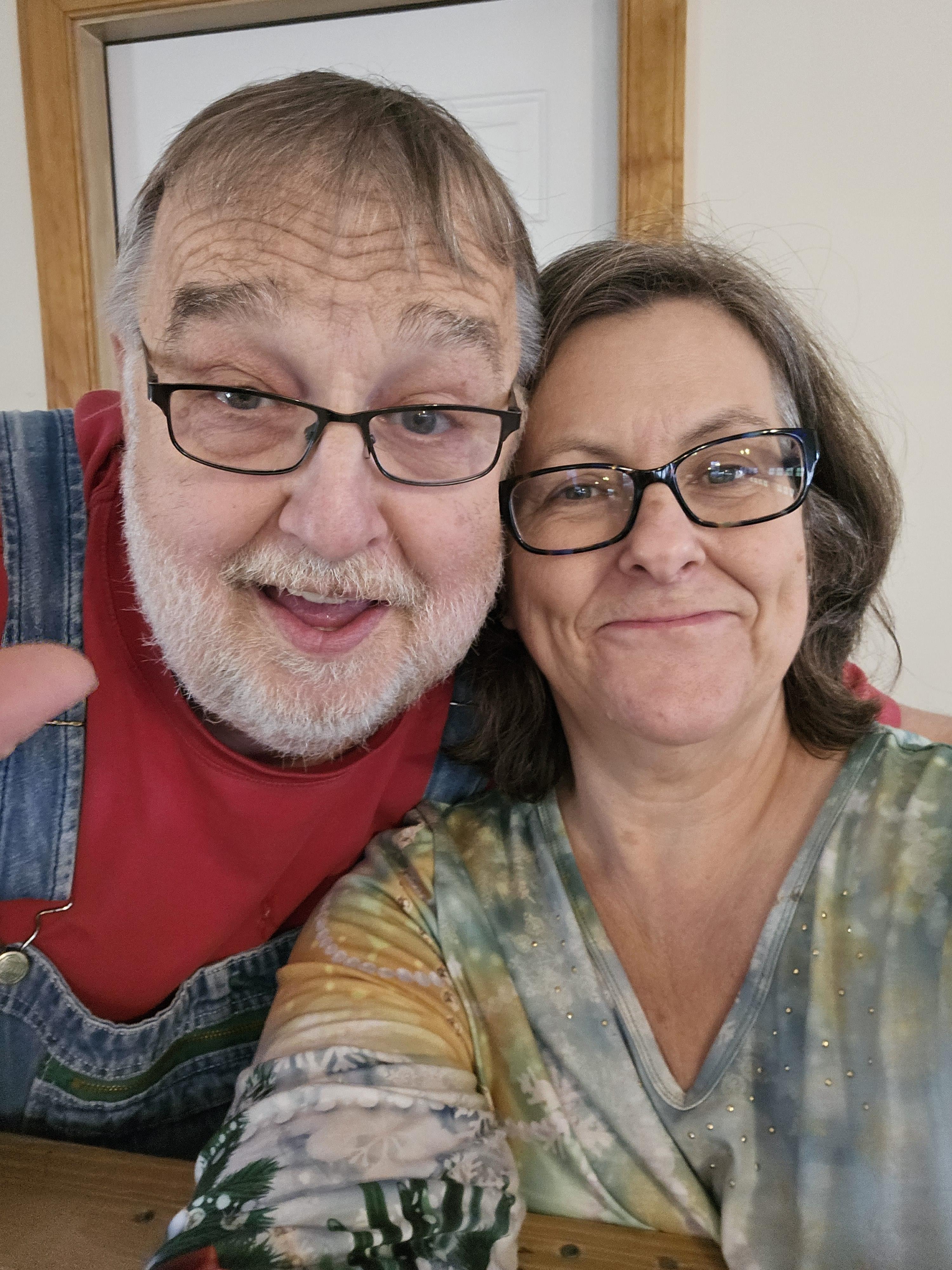 A man and woman taking a selfie