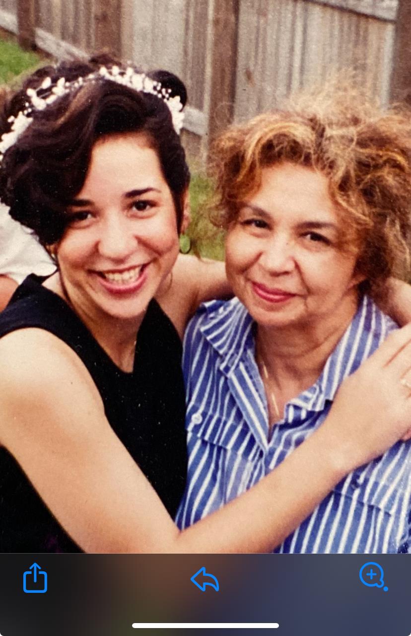 A woman hugging another woman