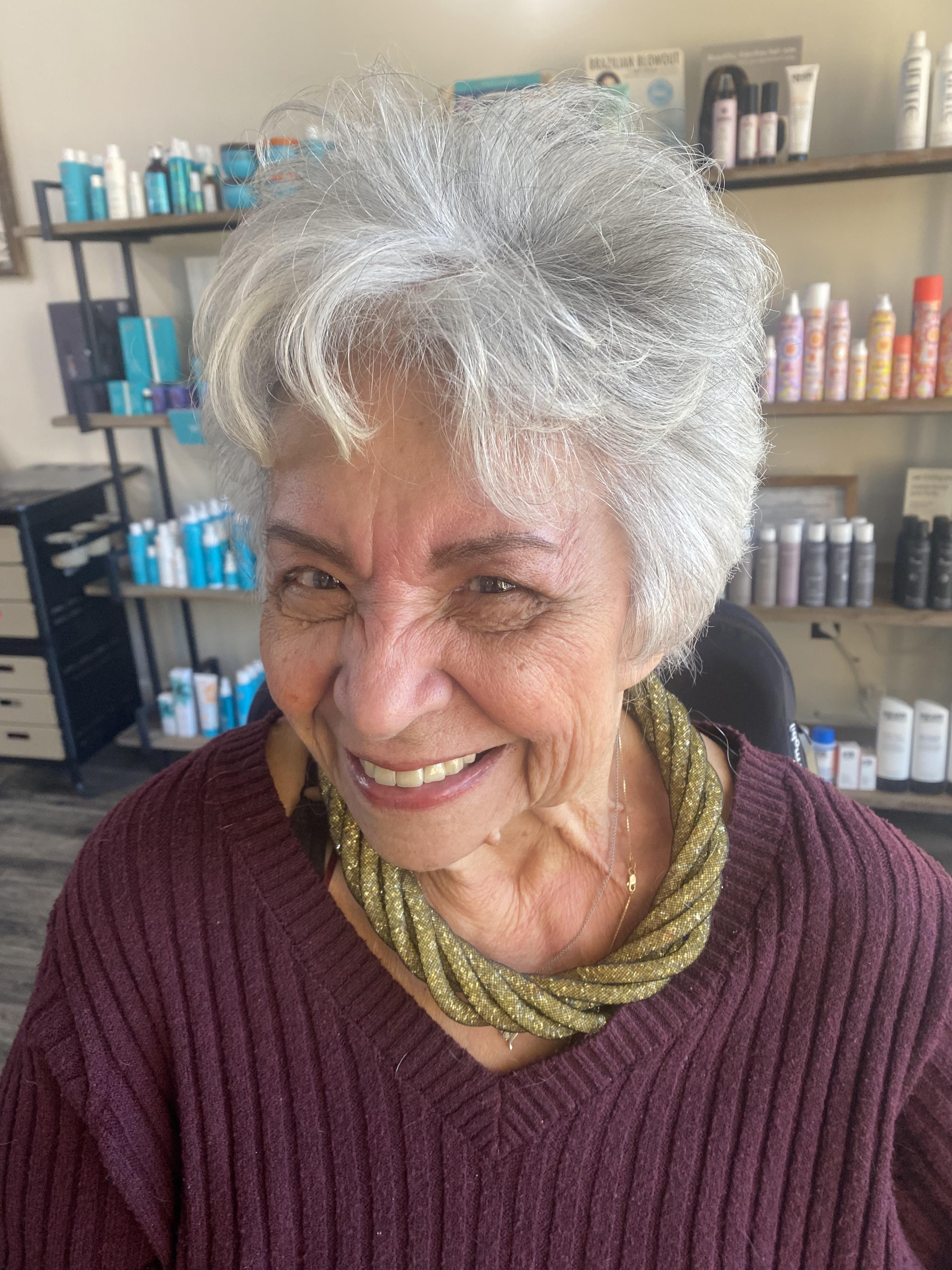 A woman smiling at camera