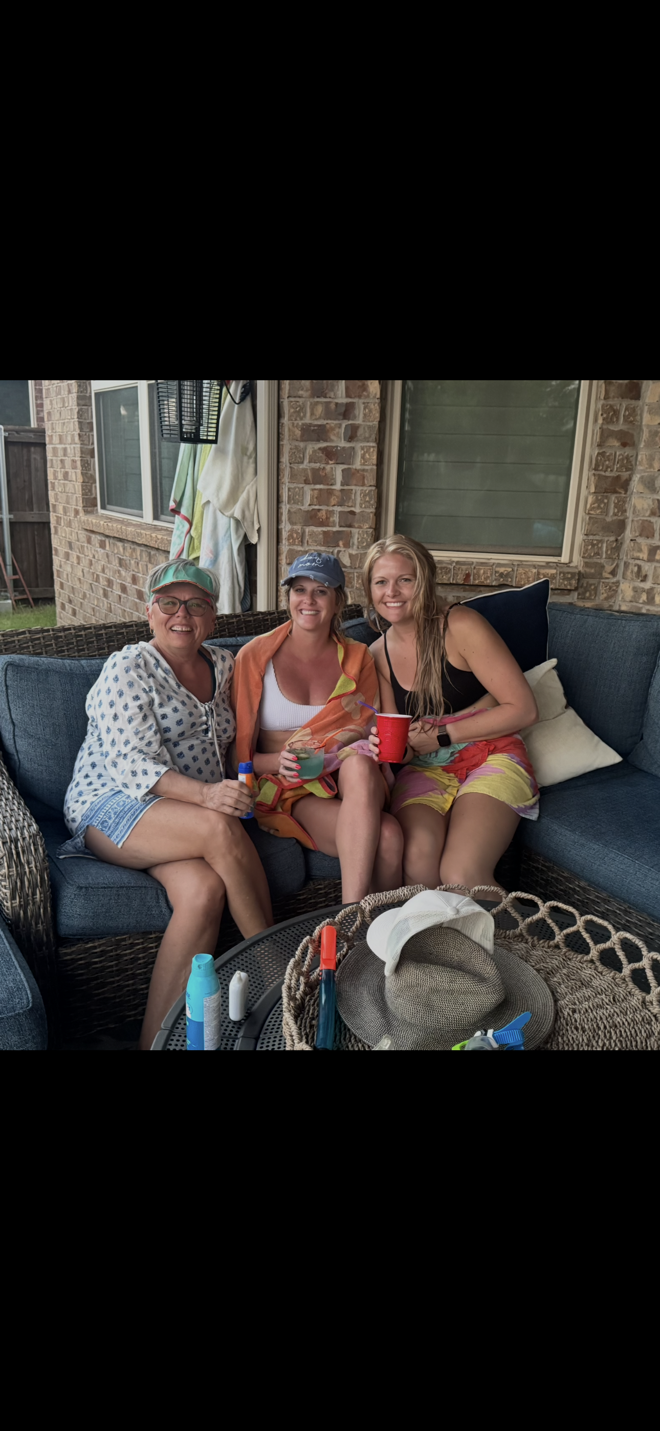 A group of women sitting on a couch