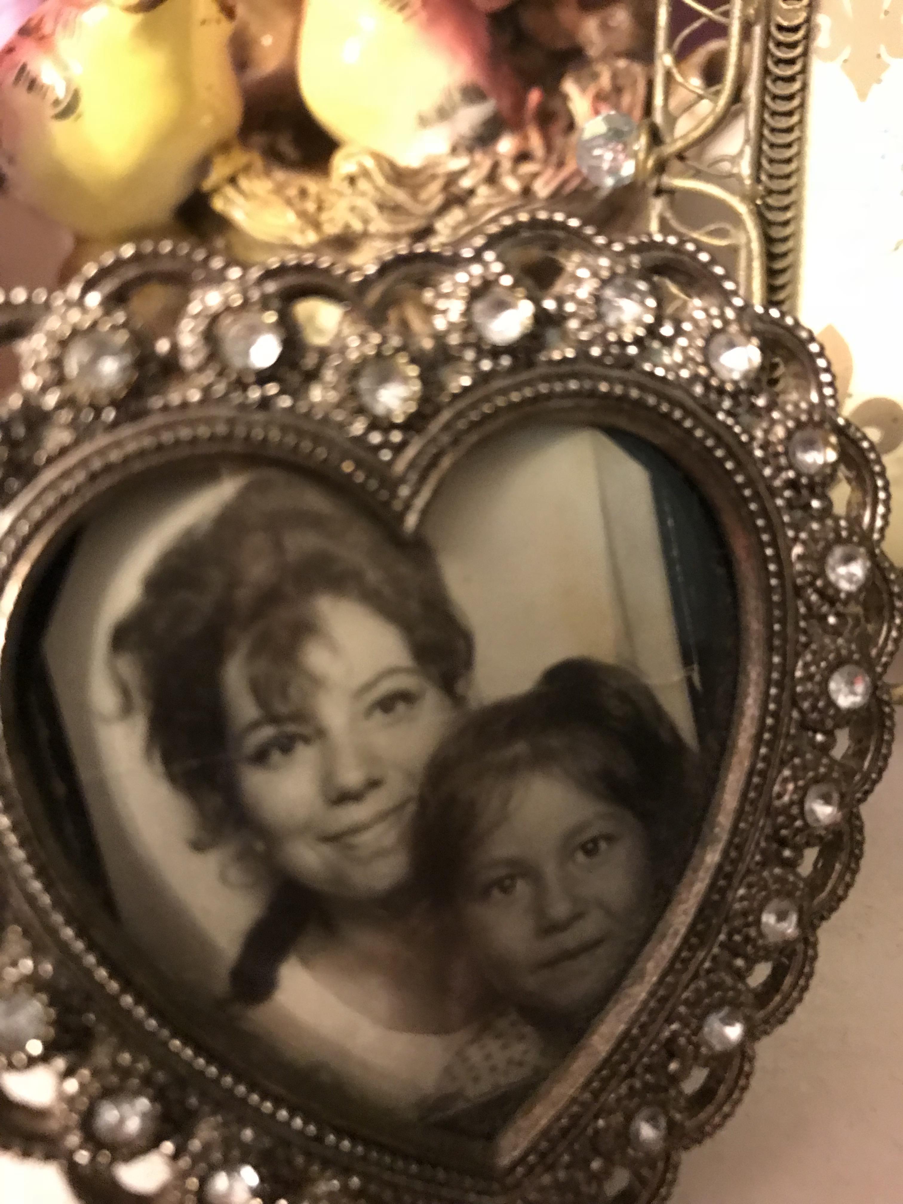 A picture of a woman and two girls