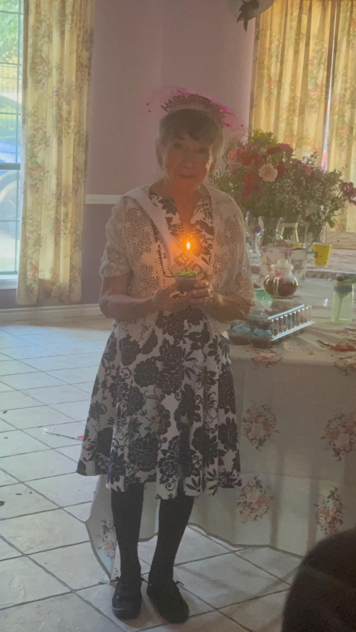 A woman holding a candle