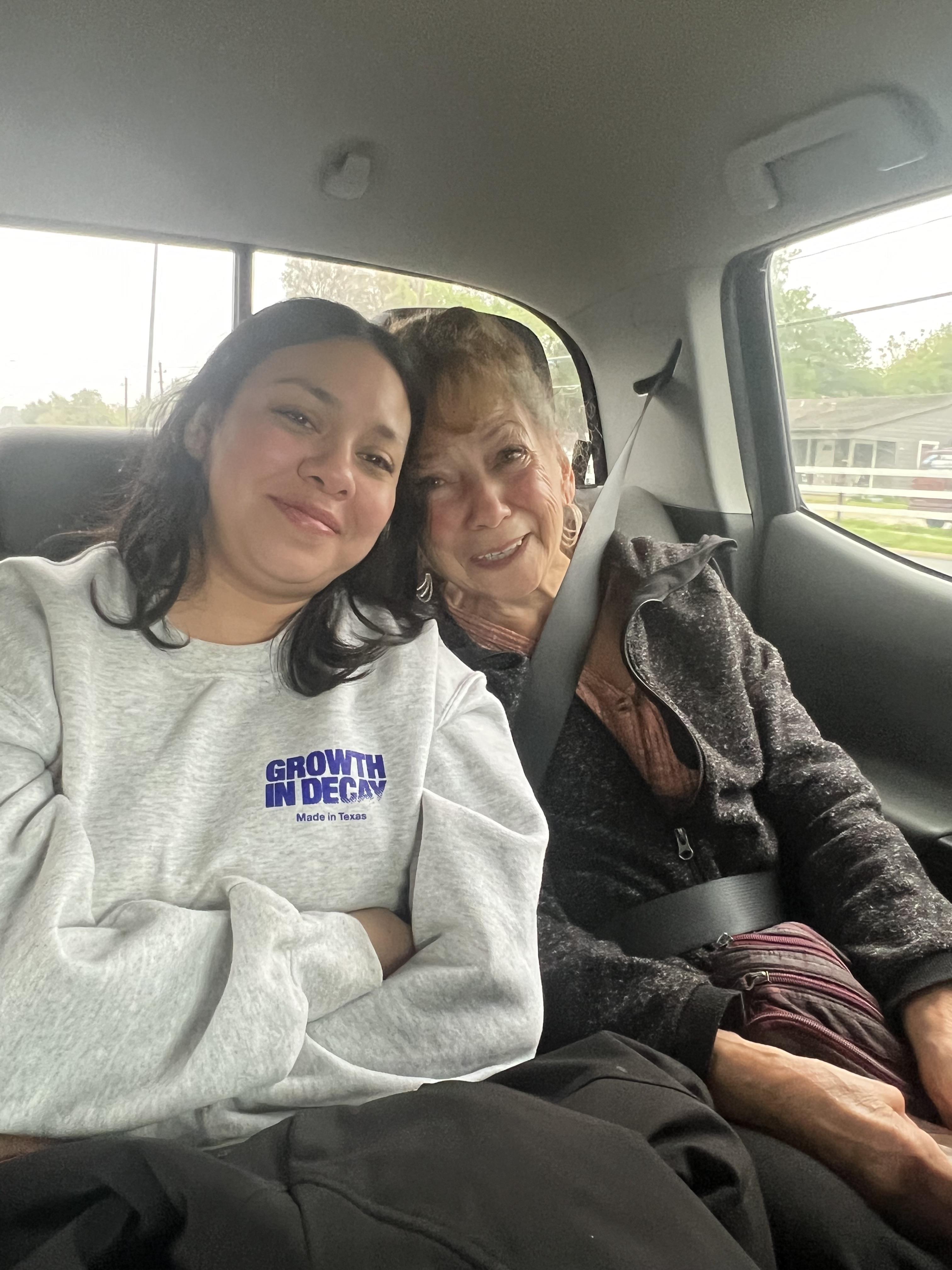 Two women sitting in a car