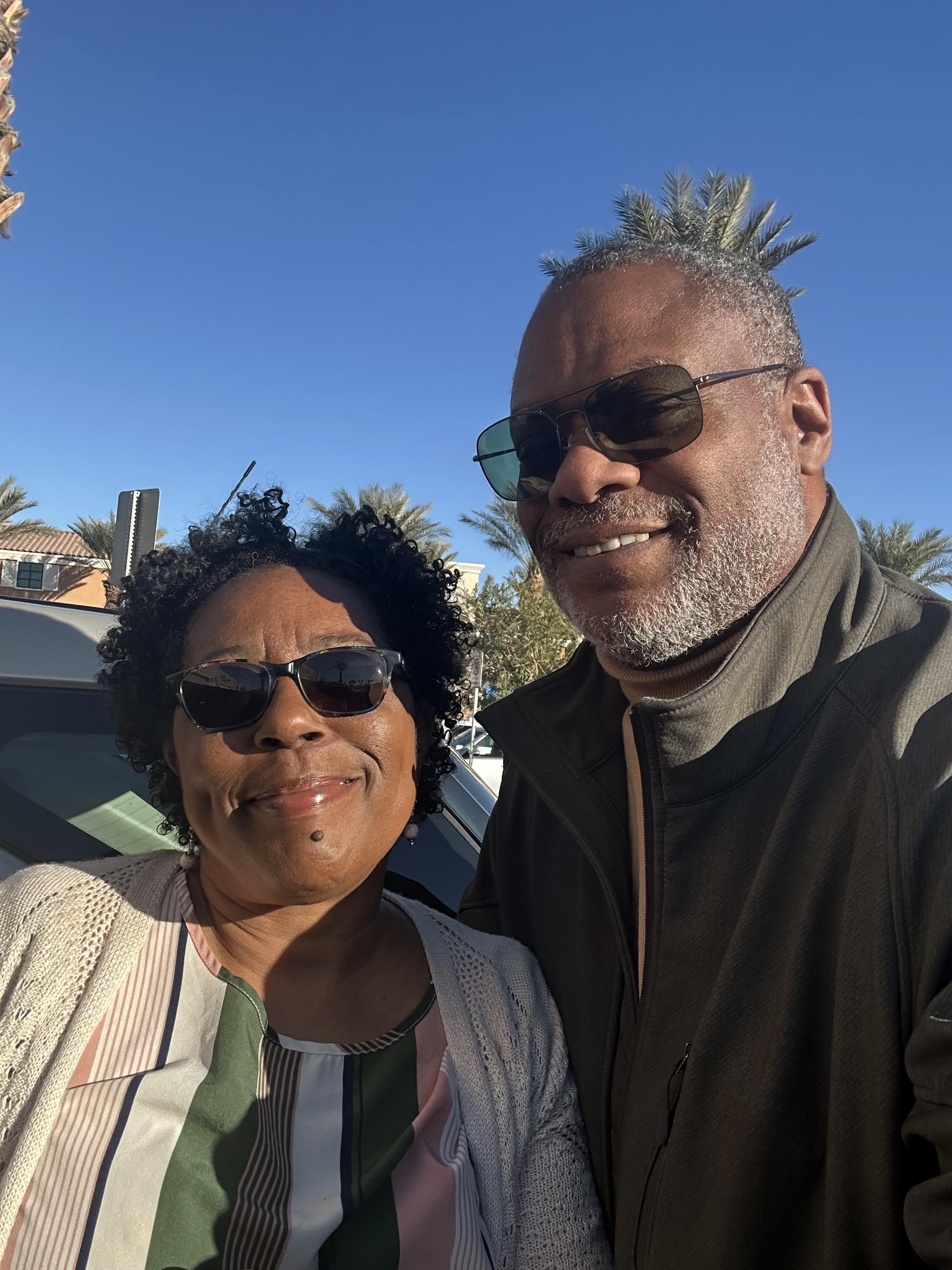 A man and woman taking a selfie